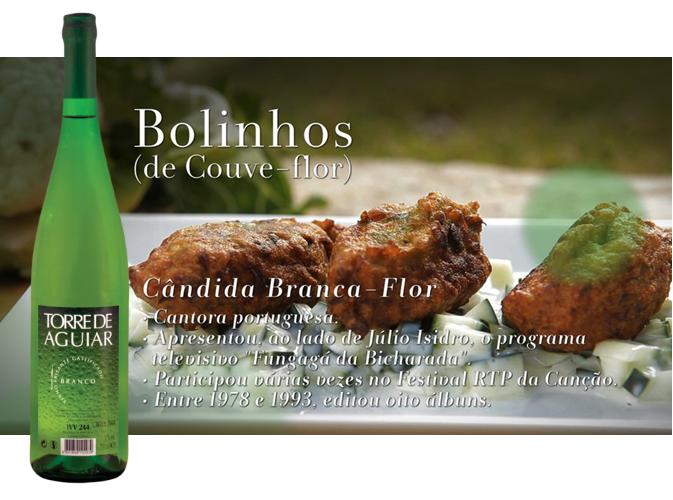 INGREDIENTES   [Para 6 a 8 pessoas] 200 g couve flor 150 g ervilhas 1 pepino  1 dente de alho 5 colheres de sopa de iogurte natural 1 colher de sopa de sumo de limão 2 ovos 150 g de farinha 1 colher de chá de cominhos 1 colher de chá de açafrão das indias Sal q.b. Pimenta q.b. PREPARAÇÃO Coloque a couve-flor a cozer numa panela com água e quando estiver quase cozida, adicione as ervilhas e deixe cozer durante mais dois minutos. Escorra a couve-flor e as ervilhas. Ainda a quente, faça um puré. Adicione farinha com uma peneira, juntando os cominhos e o açafrão da Índia. Envolva tudo. Numa taça coloque um ovo inteiro e uma clara e bata ligeiramente. Incorpore o ovo batido.  Com uma colher, molde a massa em forma de bolinhos de bacalhau e frite os bolinhos num tacho com óleo bem quente. Corte o pepino em cubos pequenos. Numa taça envolva bem o pepino, o alho, o iogurte natural, o sal e o sumo de limão.